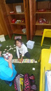 Student enjoying match the cards